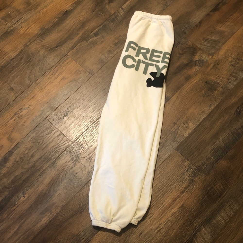 freecity Cream Sweatpants with Sage Green Lettering and Black Dove